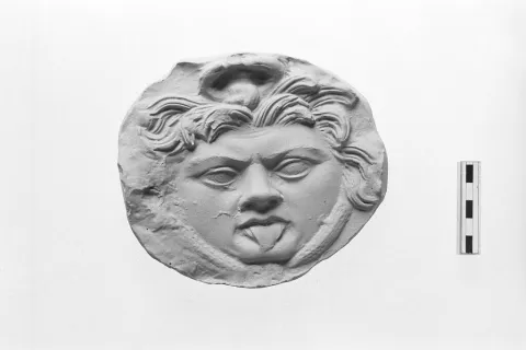 Terracotta mold with beheaded Gorgo/Medusa head, cast produced from the mold, 1st c. AD (cat. no. MF 7415)