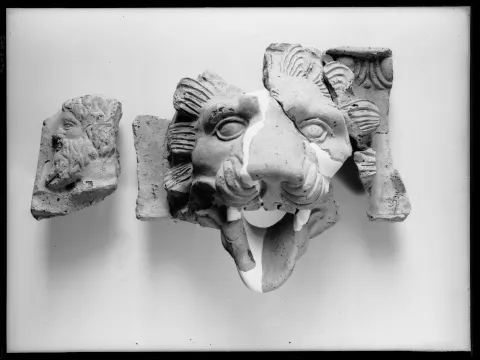 Roman terracotta sima with bearded head of Zeus and lion's head spout (cat. no. FS 498)
